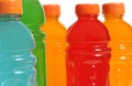 Bottles of Colorful Sports Drinks on White Background