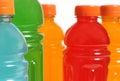 Bottles of Colorful Sports Drinks on White Background