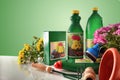 Bottles and containers of gardening products composition on whit Royalty Free Stock Photo