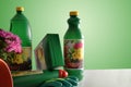 Bottles and containers of gardening products on white table Royalty Free Stock Photo