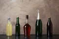 Bottles with different alcoholic drinks on table Royalty Free Stock Photo