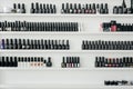 Bottles of different nail polish on shelves. Royalty Free Stock Photo