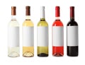 Bottles of delicious wines with blank labels on white background Royalty Free Stock Photo