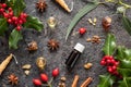 Christmas selection of essential oils with myrrh, frankincense, holly and winter spices