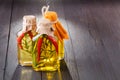 Bottles of extra virgin olive oil with aromatic herbs Royalty Free Stock Photo