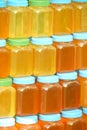 Bottles full of honey Royalty Free Stock Photo