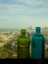 Bottles green and blue with a view