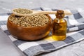Bottles of hemp oil with cannabis seeds. Medical CBD oil. Alternative medicine concept