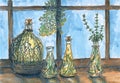Bottles With Herbal Liquids And Blue Window