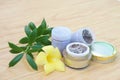 Bottles of homemade Thai herbal powder for smell to relieve dizzy symptoms, decorate with yellow flower