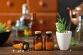 Bottles of homeopathic granules, cabinet with homeopathic remedies and tincture bottles on background. Homeopathy medicine Royalty Free Stock Photo
