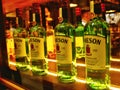Bottles of Jameson whiskey presented in a row for customers on a bar in Jameson distillery