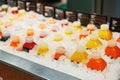 Bottles of juice on ice counter in a supermarket Royalty Free Stock Photo