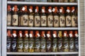 Bottles of local rum with a sticker of an extinct dodo bird in shop for sale to tourists in Port Louis, island Mauritius