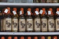 Bottles of local rum with a sticker of an extinct dodo bird in shop for sale to tourists in Port Louis, island Mauritius