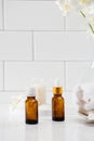 Bottles with massage essentials oils, towels and zen stones. Spa composition Royalty Free Stock Photo