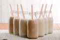 Bottles of milk with straws Royalty Free Stock Photo