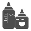 Bottles with nipples solid icon. Two plastic feeding bottle for newborn with milk glyph style pictogram on white Royalty Free Stock Photo
