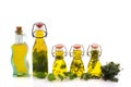 Bottles olive oil with herbs Royalty Free Stock Photo