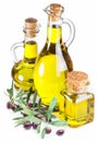 Bottles of olive oil and olive berries on white background. Royalty Free Stock Photo