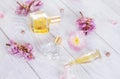 Bottles of perfume with flowers Royalty Free Stock Photo