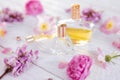 Bottles of perfume with flowers Royalty Free Stock Photo