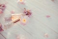 Bottles of perfume with flowers Royalty Free Stock Photo