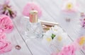 Bottles of perfume with flowers Royalty Free Stock Photo