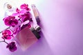 Bottles of perfume with orchid Royalty Free Stock Photo