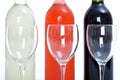 Bottles of red, white and rose wine with glasses Royalty Free Stock Photo