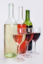 Bottles of red, white and rose wine with glasses Royalty Free Stock Photo