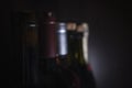 Bottles of red wine and sparkling wine on a dark background Royalty Free Stock Photo