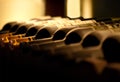 Bottles of red wine on a wood shelf Royalty Free Stock Photo