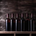 Bottles of red wine on a wooden shelf. banner background for winery, bar or shop Generative AI. Royalty Free Stock Photo