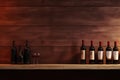 Bottles of red wine on a wooden shelf. Copy space for winery Royalty Free Stock Photo