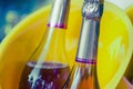 Bottles with red wine in a yellow ice bucket. drinking wine. wine festival Royalty Free Stock Photo