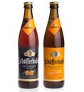 Bottles of Schofferhofer white and dark wheat beer isolated on a Royalty Free Stock Photo