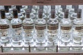 Bottles of Smirnoff vodka on a shelf in duty free shop airport Royalty Free Stock Photo