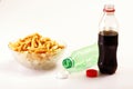 Bottles of softdrinks or soda, and chips Royalty Free Stock Photo