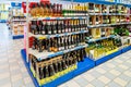 bottles of sparkling wine and prosecco and wines displayed on the shelves of supermarket Royalty Free Stock Photo