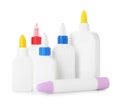 Bottles and sticks of glue on white background Royalty Free Stock Photo