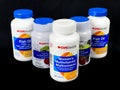 Bottles of Various CVSHealth Vitamins and Supplements for Good Health