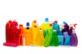Bottles with various detergents isolated on a white background.
