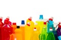 Bottles with various detergents isolated on a white background.