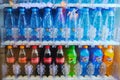 Bottles of water and fizzy drinks inside of vending machine