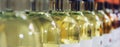 Bottles of white wine, selective focus Royalty Free Stock Photo