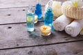 Bottles wih essential aroma oil, towels, candles and wisps Royalty Free Stock Photo