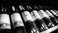 Bottles of wine background.Pictures are blurred.black and white Royalty Free Stock Photo