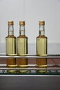 Bottles with white wine at bottling plant Royalty Free Stock Photo