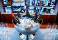 Bottles of wine and champagne in ice bowl Royalty Free Stock Photo